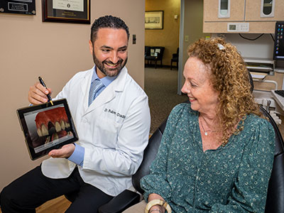 Dr. Ovadia educating a patient