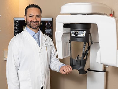 Dr. Ovadia with a CT scanner